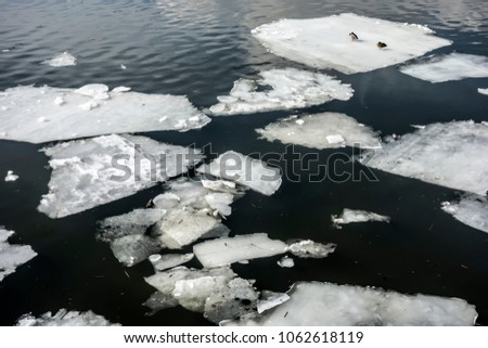 Abstract background of drifting ice on water. Debacle.