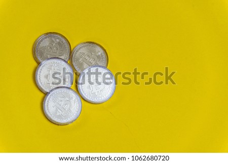 Golden bitcoin on yellow background. New virtual money. Bitcoin processor and microchips. Electronic currency, Internet Finance