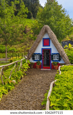 Traditional Madeira house in Santana Portugal - travel background