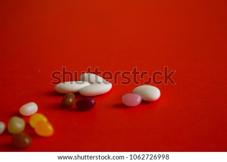 sugary almond at wedding party with colorful candies