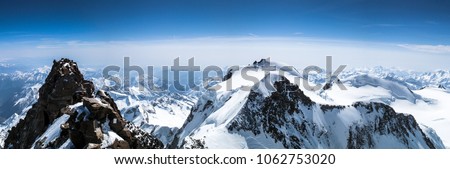 panoramic view of the mountain landscape from Dufourspitze to Signalkuppe in the Swiss Alps near Zermatt Royalty-Free Stock Photo #1062753020