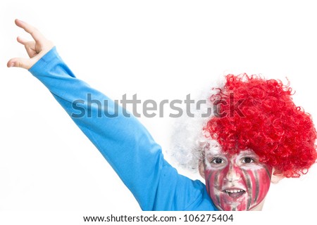 Boy with painted face. Sport supporter.