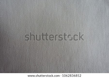 Surface of white jeans fabric from above