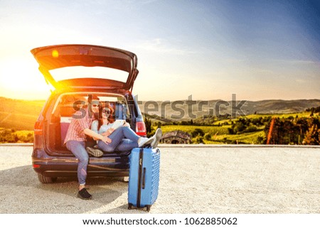 Summer car on road and two lovers 