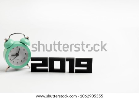 Happy new year 2019 with new timing in life, wooden clock on wood wall look like zero, warming tone