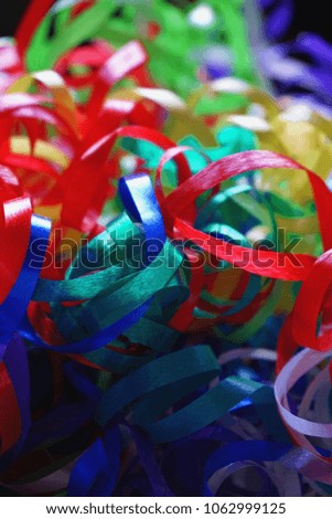 Tinsel, stripes isolated. Colorful ribbons, decorations for holiday. Useful background. Colors: red, green, yellow, violet, blue