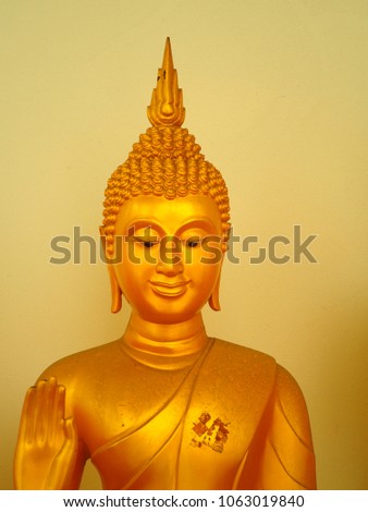 Golden buddha statue at Wat Prot Ket Chettharam Temple in thailand.