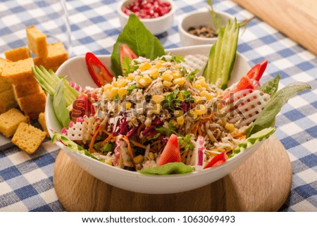 bowl of salad with vegetables and greens 