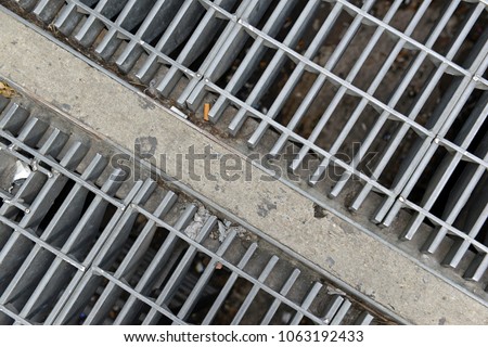 Iron Subway grates on sidewalk of Manhattan in New York City, made famous by the vintage photo of Marilyn Monroe standing atop of one in a dress
