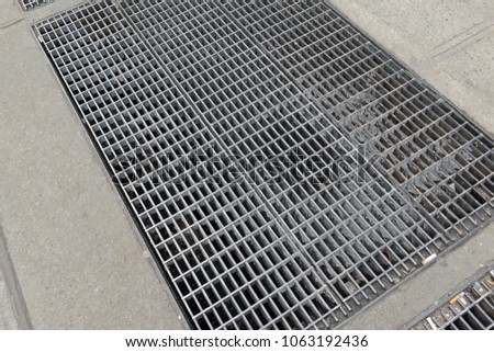 Iron Subway grates on sidewalk of Manhattan in New York City, made famous by the vintage photo of Marilyn Monroe standing atop of one in a dress