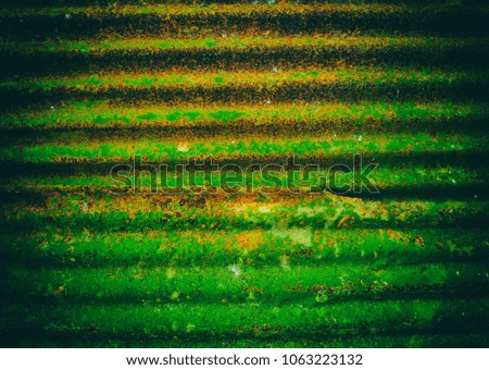 The abstract art design background of grunge surface Zinc wall,show texture from old and aged for long life time,too many dust and dirty,blurry light around.
