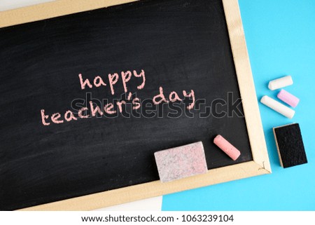 Happy Teacher's Day wording on a black board
