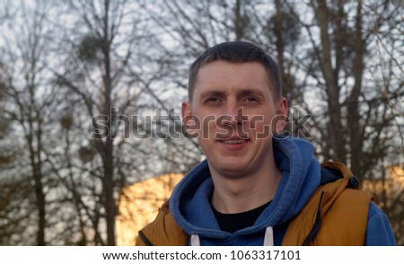 beautiful portrait of a young man on the street