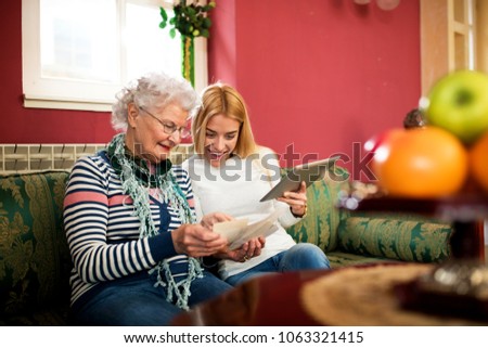Quality time spent with grandmother, two generation compare old and new photos