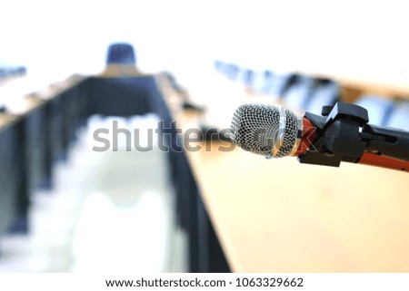 Close-up of microphone in meeting room selective focus and shallow depth of field