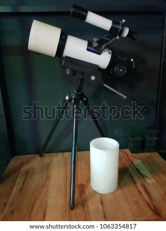 mini telescope on the showcase.
