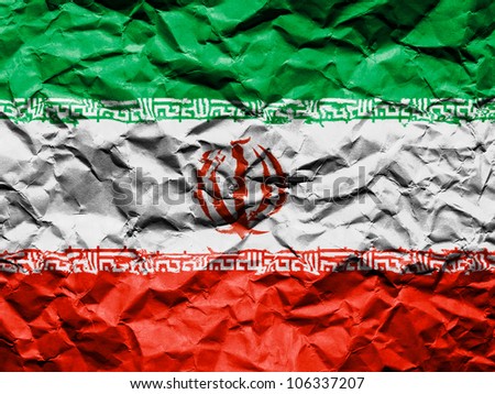 The Iranian flag painted on crumpled paper