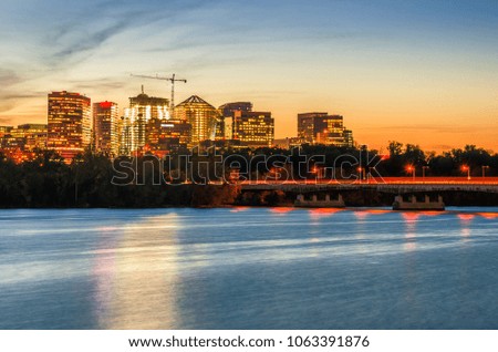Rosslyn Business District at Twilight. The Potomac River is in Foreground. Washington DC, USA.