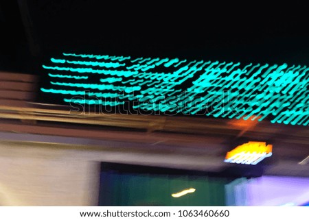 abstract blurred and bokeh of lights restaurant signs