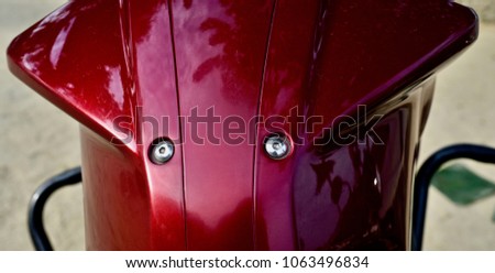Beautiful red petrol tank of a motorbike isolated stock photo