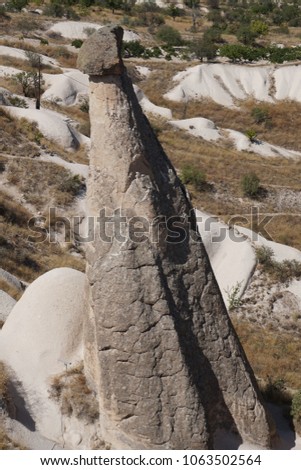 Cappadocia, Kapadokya Otelleri, semi-arid region in central Turkey, is known for its distinctive “fairy chimneys,” tall, cone-shaped rock formations clustered in Monks Valley, Göreme, Turkey