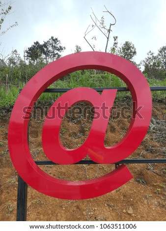 Red arroba symbol  on the mountain national park in Thailand .