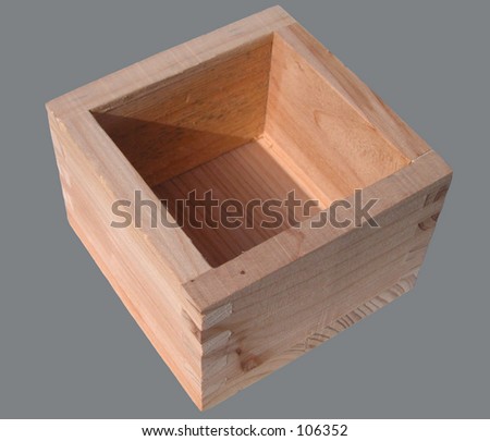A wooden sake cup-isolation on a gray background.
