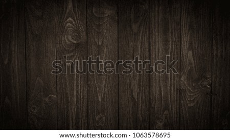 Old brown board in warm colors. Texture. Wooden background.