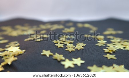 little shiny star with black background. 