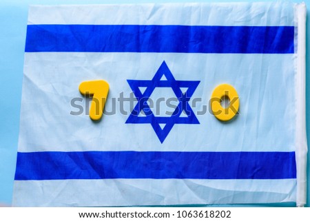 70 celebrating cute yellow number.Israel 70th Independence Day , April 19, 2018, Yom Haatzmaut. National flag of of Israel.