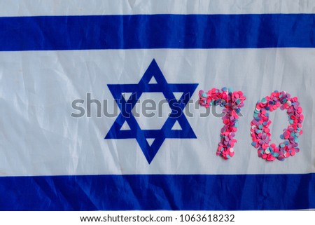 70 celebrating confetti number.Israel 70th Independence Day , April 19, 2018, Yom Haatzmaut. National flag of of Israel.Copy space for text.