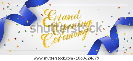 Grand opening ceremony festive banner design in frame with confetti and blue streamer on white background. Lettering can be used for invitations, signs, announcements Royalty-Free Stock Photo #1063624679