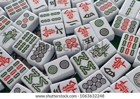 chinese mahjong on the table,the chinese word meaning ten thousand