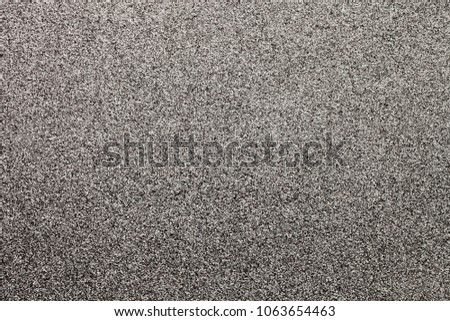 Abstract texture background of silver glitter looking like static tv noise