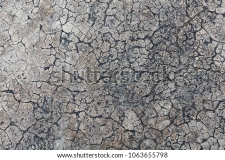 Texture of concrete floor, cracked concrete background
