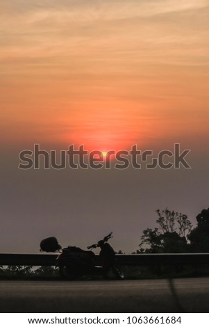 The beautiful background of the sun in the misty sky in the morning of winter Thailand.
The magic of the sunrise in the morning in the countryside in the colorful countryside.
Good Morning Loneliness