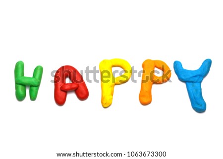  happy word from Colorful play dough molded plasticine clay isolated on white background with copy space for text. Creativity children toys concept.