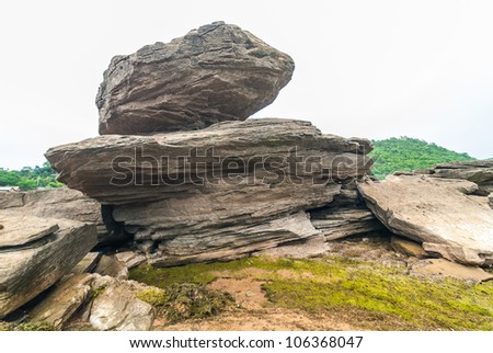 Large stones stacked in nature.
