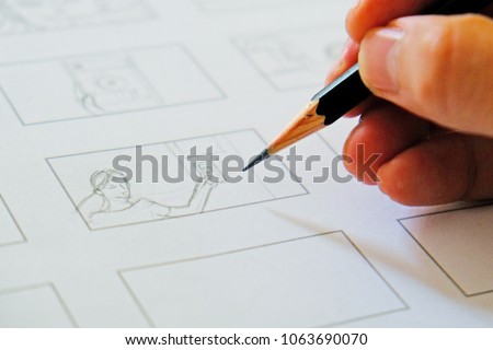 hand drawing storyboard idea Royalty-Free Stock Photo #1063690070