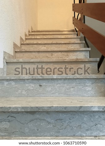 Stairway with stony stairs in a house