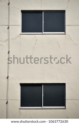 This is a picture of a flat wall and a window.