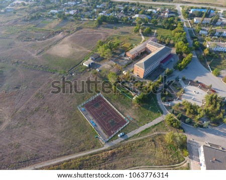 View from the top of the village. Houses and gardens. Countryside, rustic landscape. Aerial photography.