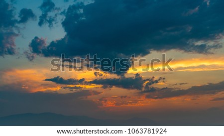 The colorful sunset sky and clouds in summer. Chiang Mai, Thailand.