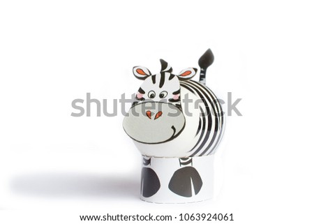 Easter or spring figure of zebra shaped egg isolated on white background