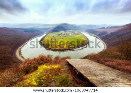 The Saar river bend near Taben-Rodt on a cold day in winter Royalty-Free Stock Photo #1063949714