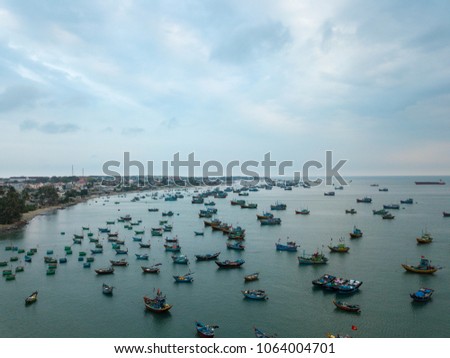 Top view. Aerial view from drone. Royalty high quality free stock image of Mui Ne fishing harbour or fishing village. Mui Ne fishing harbor is a popular tourist destination. Phan Thiet city, Vietnam