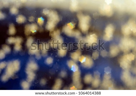 Sunny blurred background, bokeh as asterisks