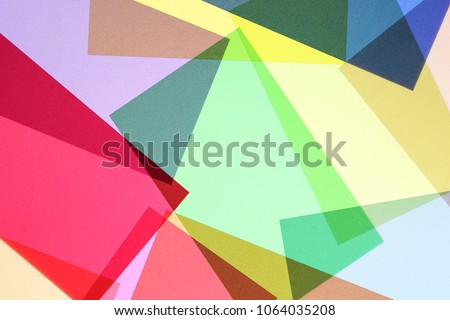set of multicolored and overlapping transparencies, abstract colorful background Royalty-Free Stock Photo #1064035208