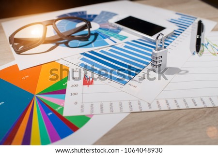 Financial analysis, lock accounting, statistics, investment, sales analysis of the company in the past year, economic data Royalty-Free Stock Photo #1064048930