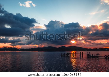 Sunrise on a pier in the Lagoon at Conceição in Florianópolis, Brazil.